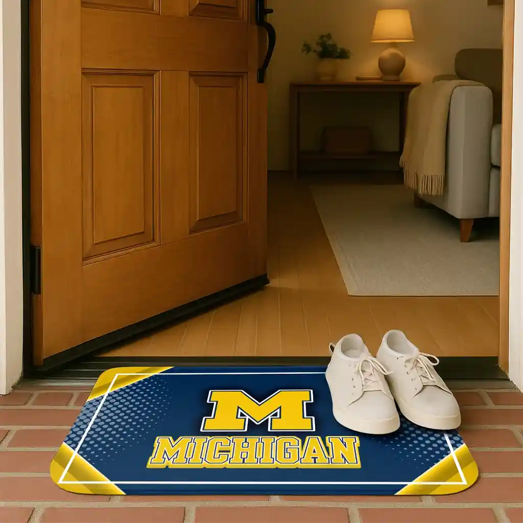 michigan-wolverines-silver-halftone-blue-doormat-fashion-forward.webp