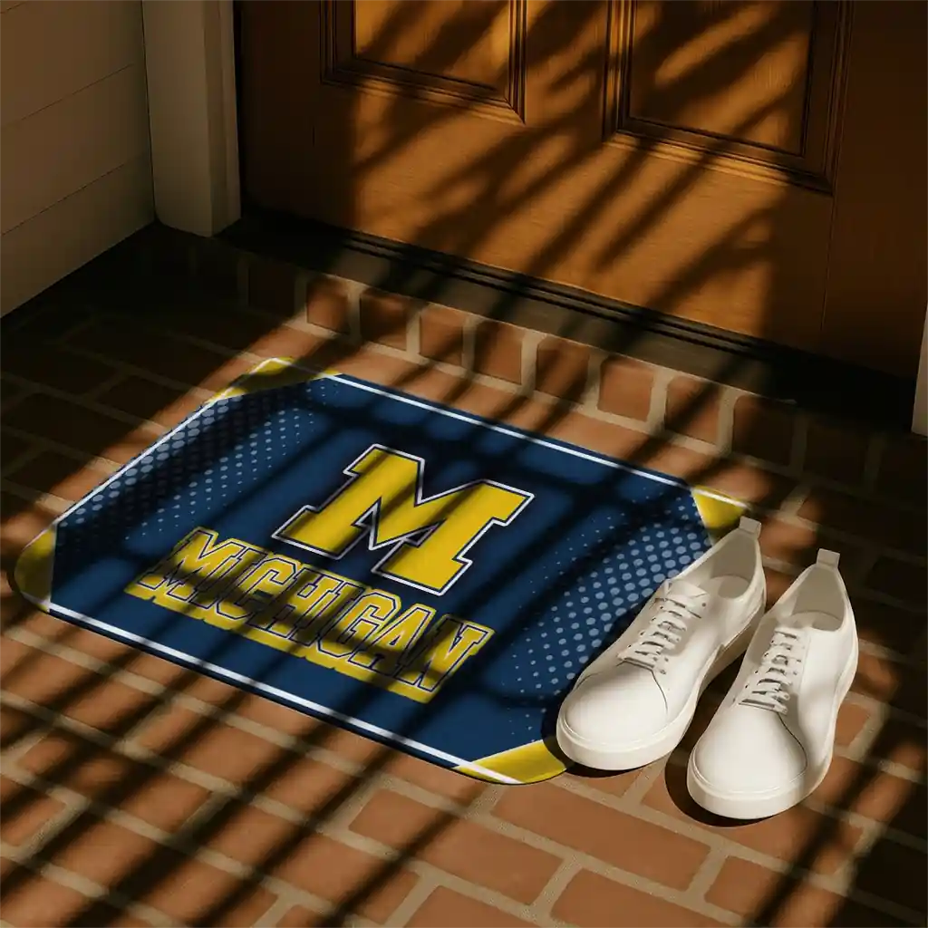 michigan-wolverines-silver-halftone-blue-doormat-trendy.webp