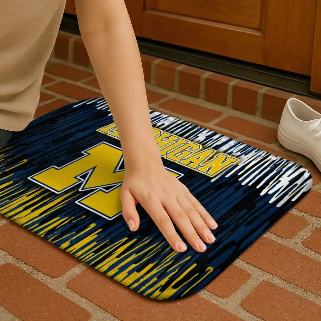 michigan-wolverines-vertical-flow-blue-doormat-premium-grade.webp