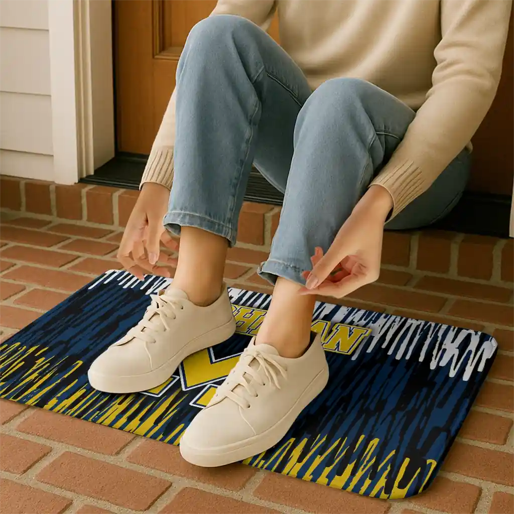 michigan-wolverines-vertical-flow-blue-doormat-top-rated.webp
