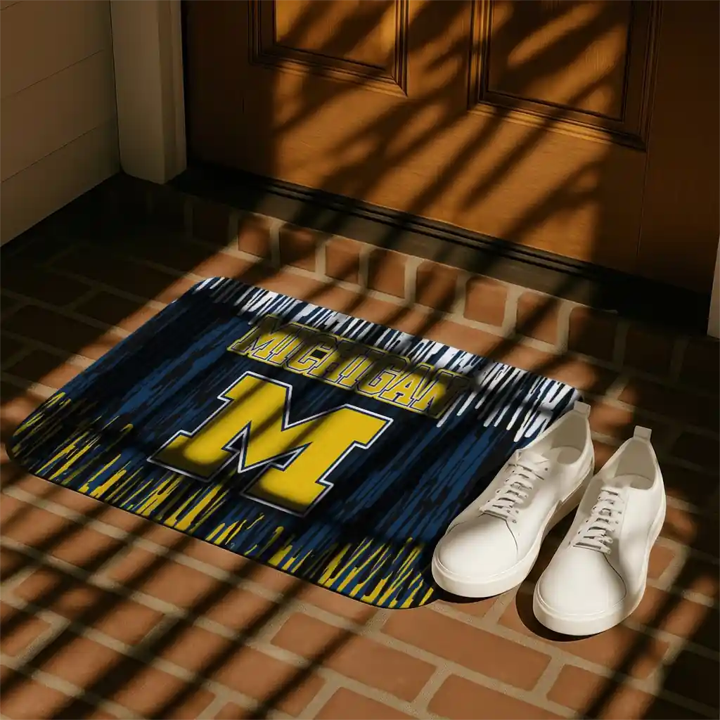 michigan-wolverines-vertical-flow-blue-doormat-trendy.webp