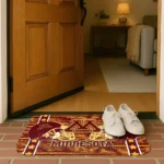 minnesota-golden-gophers-helmet-illustration-maroon-doormat-best-selling.webp