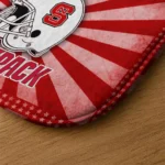 nc-state-wolfpack-helmet-centerpiece-red-doormat-best-selling.webp