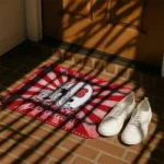 nc-state-wolfpack-helmet-centerpiece-red-doormat-best-selling.webp