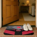 nebraska-cornhuskers-chevron-points-red-black-doormat-best-selling.webp