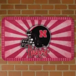 nebraska-cornhuskers-helmet-centerpiece-red-doormat-best-selling.webp