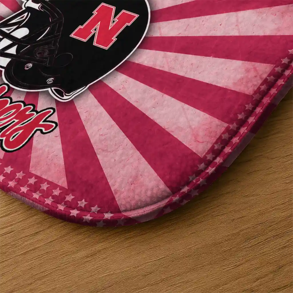 nebraska-cornhuskers-helmet-centerpiece-red-doormat-latest-model.webp