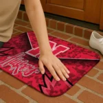 nebraska-cornhuskers-layered-lines-red-doormat-best-selling.webp