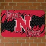nebraska-cornhuskers-plate-rip-red-doormat-best-selling.webp