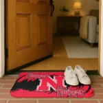 nebraska-cornhuskers-plate-rip-red-doormat-best-selling.webp
