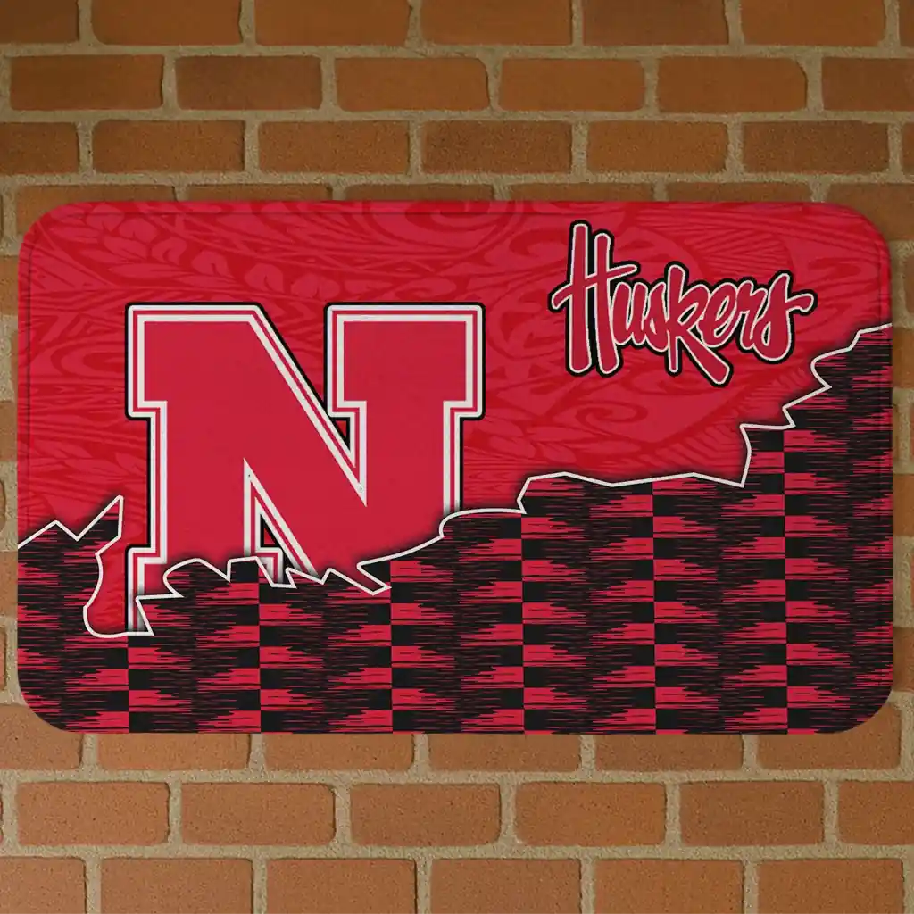 nebraska-cornhuskers-tribal-detailing-red-black-doormat-best-selling.webp nebraska cornhuskers tribal detailing red black doormat best selling