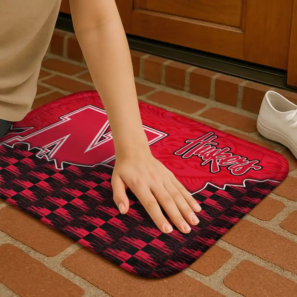 nebraska-cornhuskers-tribal-detailing-red-black-doormat-premium-grade.webp