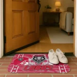 new-mexico-lobos-helmet-illustration-red-doormat-best-selling.webp