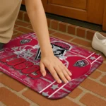new-mexico-lobos-helmet-illustration-red-doormat-best-selling.webp