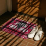 new-mexico-lobos-helmet-illustration-red-doormat-best-selling.webp