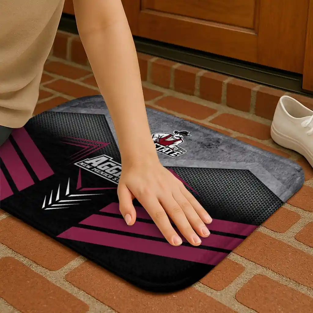 new-mexico-state-aggies-chevron-points-crimson-black-doormat-premium-grade.webp