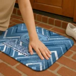 north-carolina-tar-heels-chevron-geometrics-light-blue-doormat-best-selling.webp