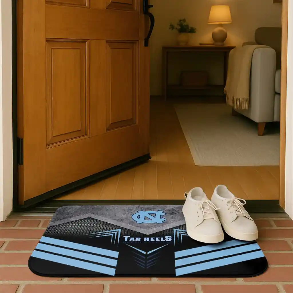 north-carolina-tar-heels-chevron-points-light-blue-black-doormat-fashion-forward.webp