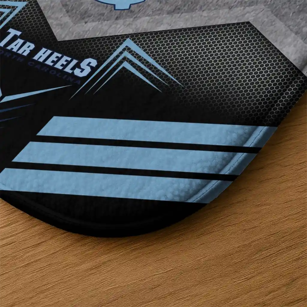 north-carolina-tar-heels-chevron-points-light-blue-black-doormat-latest-model.webp