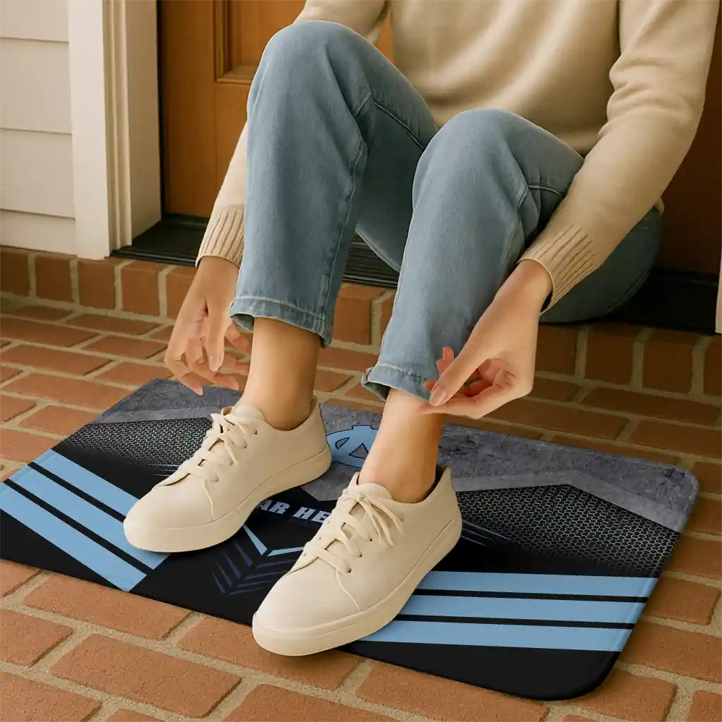 north-carolina-tar-heels-chevron-points-light-blue-black-doormat-top-rated.webp