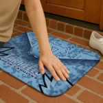 north-carolina-tar-heels-layered-lines-light-blue-doormat-best-selling.webp