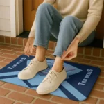 north-carolina-tar-heels-ninja-mesh-light-blue-doormat-best-selling.webp