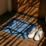 north-carolina-tar-heels-ninja-mesh-light-blue-doormat-best-selling.webp