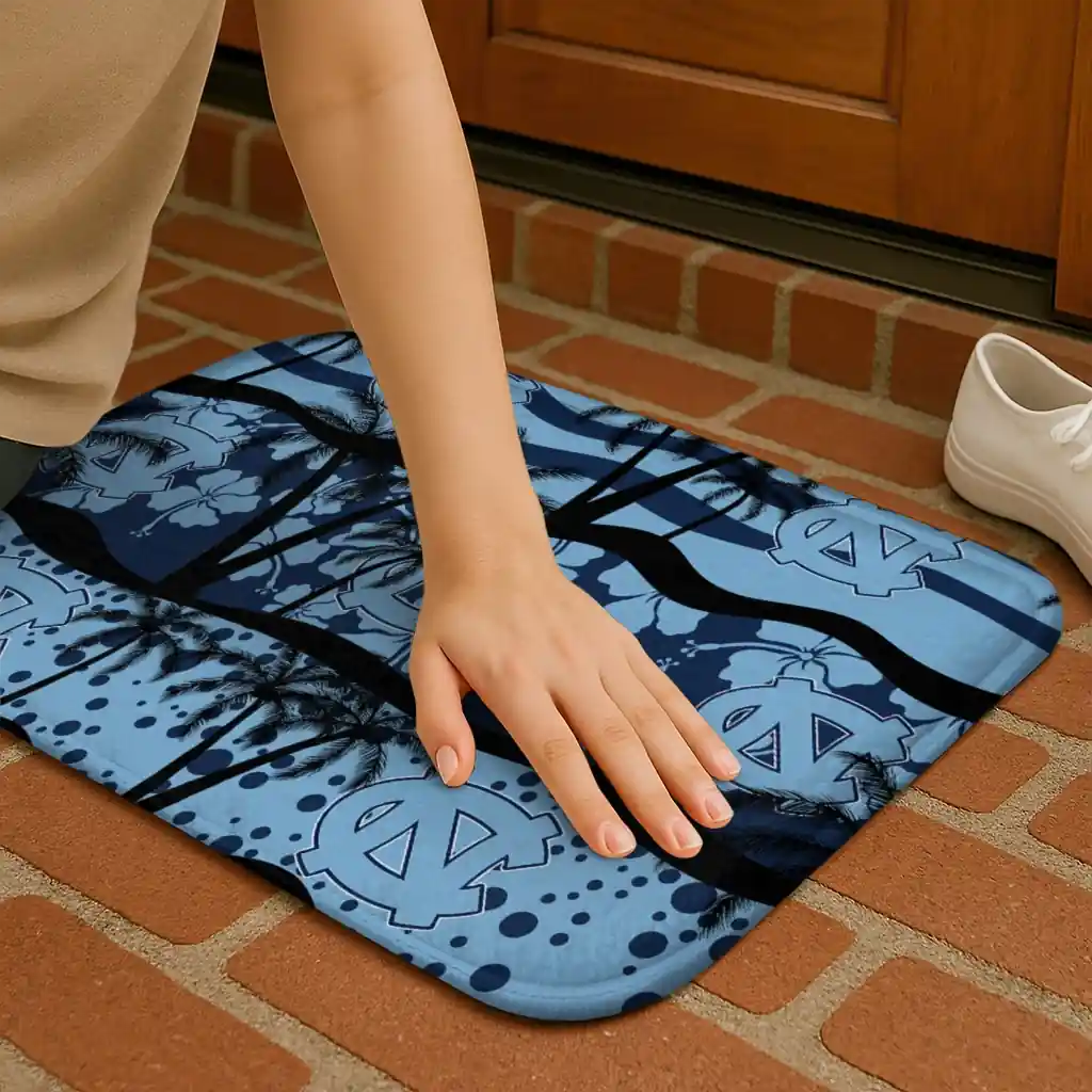 north-carolina-tar-heels-palm-silhouette-light-blue-black-doormat-premium-grade.webp