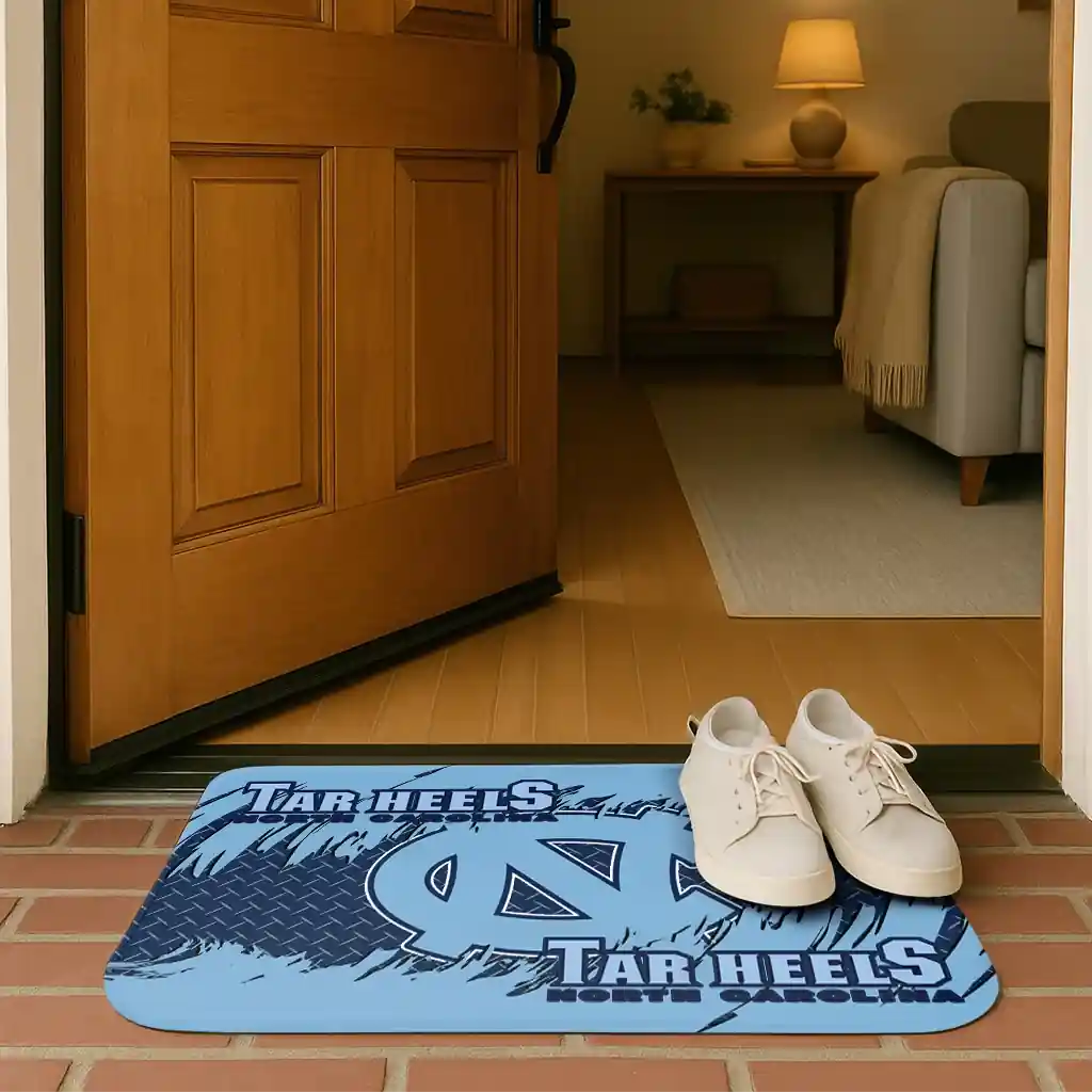 north-carolina-tar-heels-plate-rip-light-blue-doormat-fashion-forward.webp