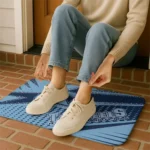 north-carolina-tar-heels-sharp-flash-light-blue-doormat-best-selling.webp