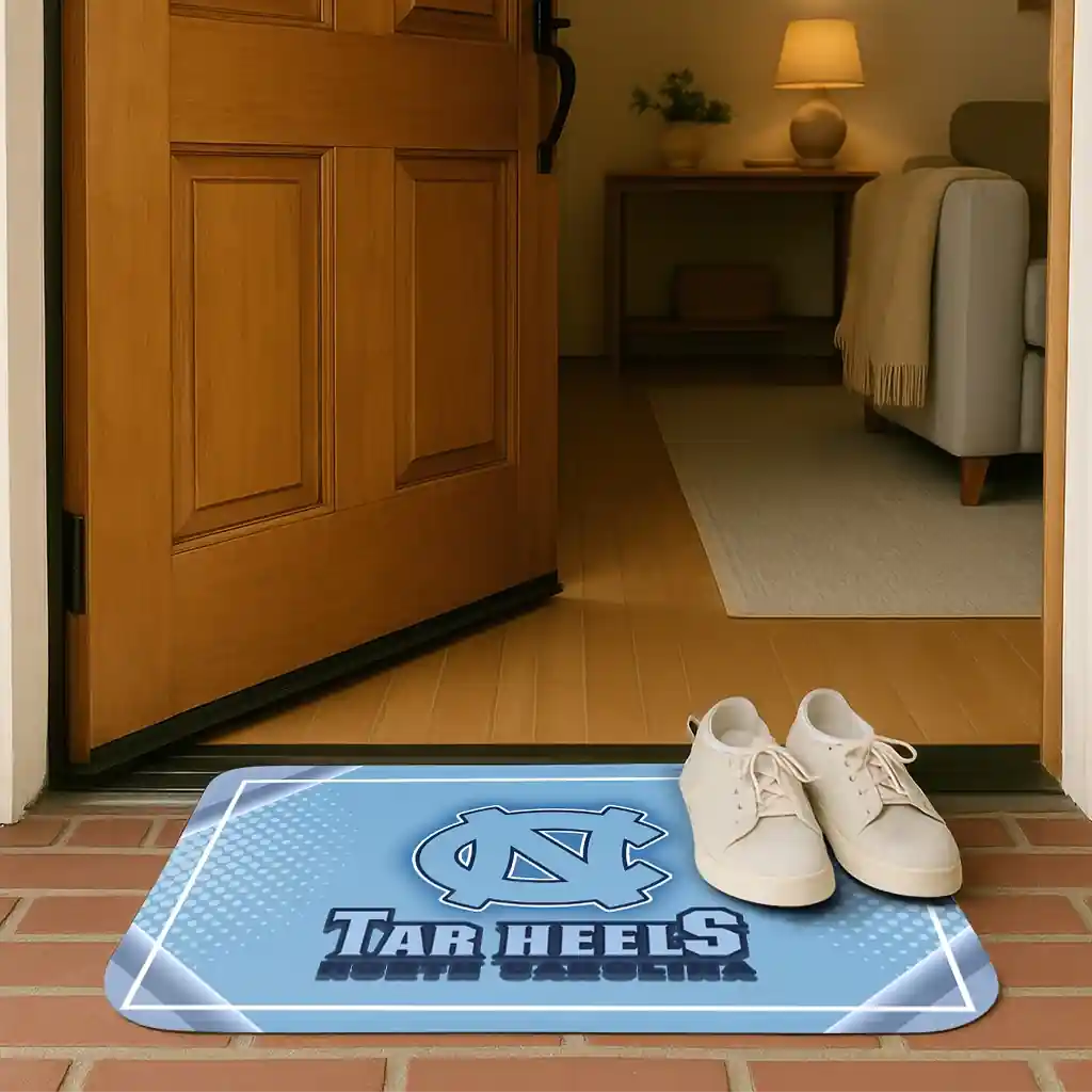 north-carolina-tar-heels-silver-halftone-light-blue-doormat-fashion-forward.webp