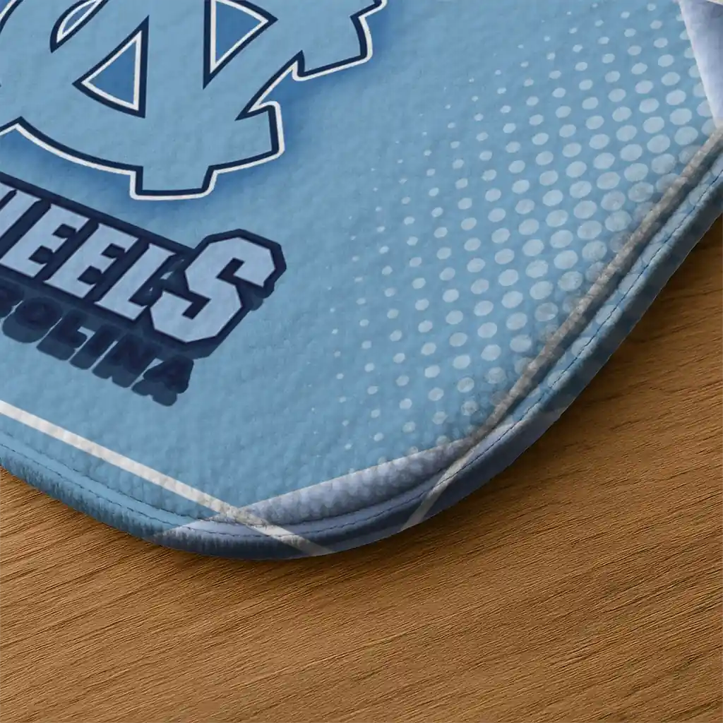 north-carolina-tar-heels-silver-halftone-light-blue-doormat-latest-model.webp