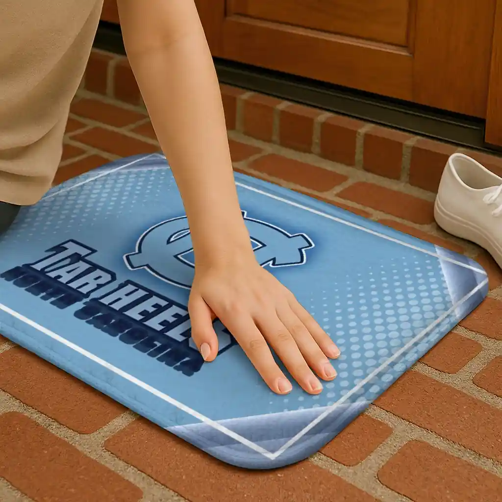 north-carolina-tar-heels-silver-halftone-light-blue-doormat-premium-grade.webp
