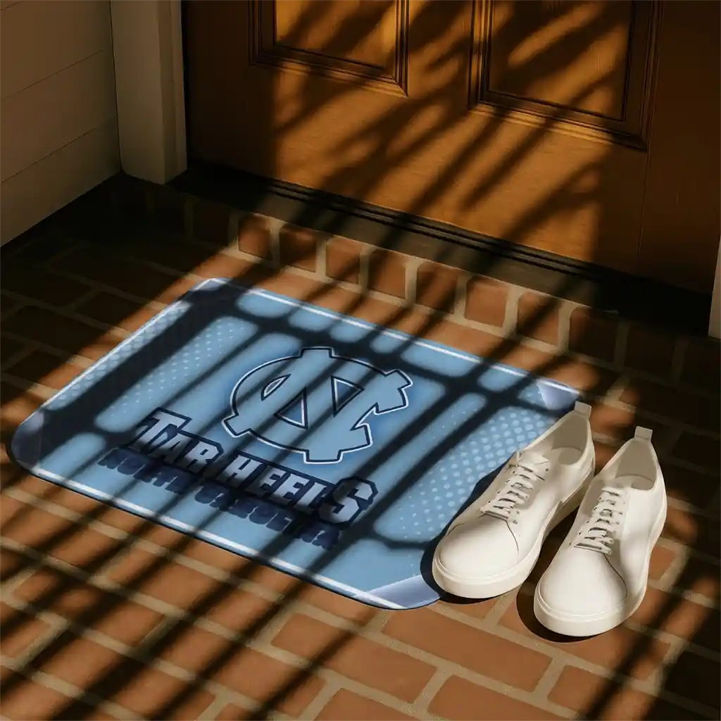 north-carolina-tar-heels-silver-halftone-light-blue-doormat-trendy.webp