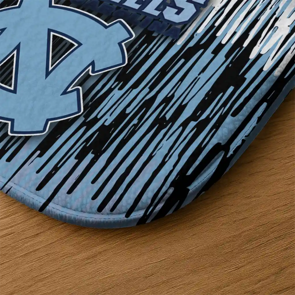 north-carolina-tar-heels-vertical-flow-light-blue-doormat-latest-model.webp