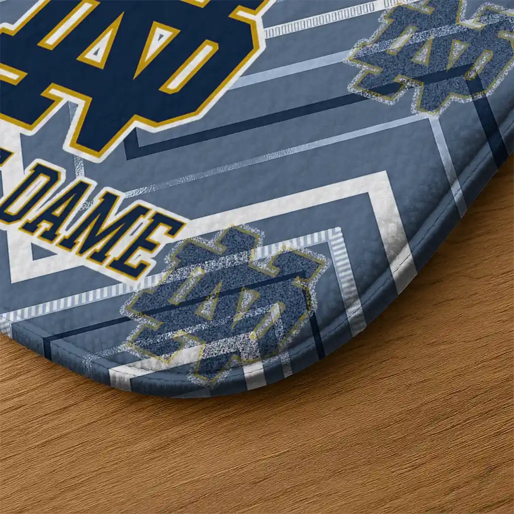 notre-dame-fighting-irish-chevron-geometrics-navy-doormat-latest-model.webp