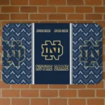 notre-dame-fighting-irish-chevron-stack-navy-doormat-best-selling.webp
