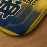 notre-dame-fighting-irish-pixel-blur-navy-doormat-best-selling.webp