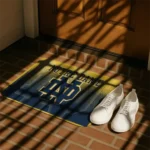 notre-dame-fighting-irish-pixel-blur-navy-doormat-best-selling.webp