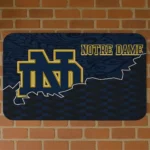 notre-dame-fighting-irish-tribal-detailing-navy-black-doormat-best-selling.webp