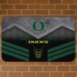 oregon-ducks-chevron-points-green-black-doormat-best-selling.webp