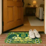 oregon-ducks-helmet-illustration-green-doormat-best-selling.webp