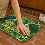 oregon-ducks-helmet-illustration-green-doormat-best-selling.webp
