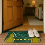 oregon-ducks-hexagon-oval-green-doormat-best-selling.webp