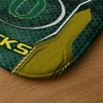 oregon-ducks-hexagon-oval-green-doormat-best-selling.webp