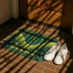 oregon-ducks-layered-lines-green-doormat-best-selling.webp