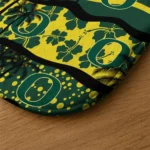 oregon-ducks-palm-silhouette-green-black-doormat-best-selling.webp