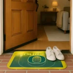 oregon-ducks-pixel-blur-green-doormat-best-selling.webp