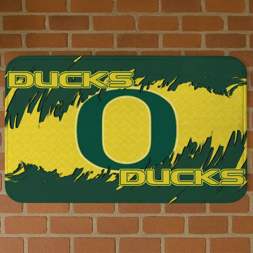 oregon-ducks-plate-rip-green-doormat-best-selling.webp oregon ducks plate rip green doormat best selling