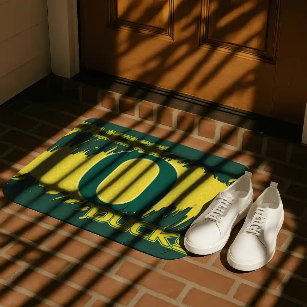 oregon-ducks-plate-rip-green-doormat-trendy.webp